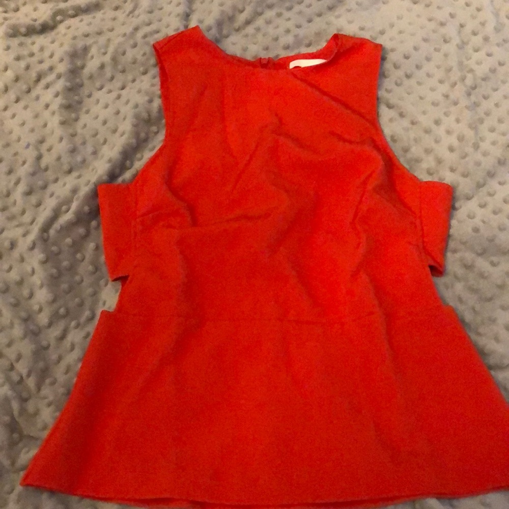 Red peplum top with side cut out
